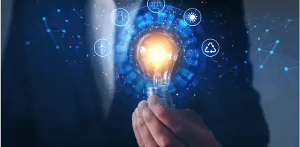 Businessman hand holding light bulb 