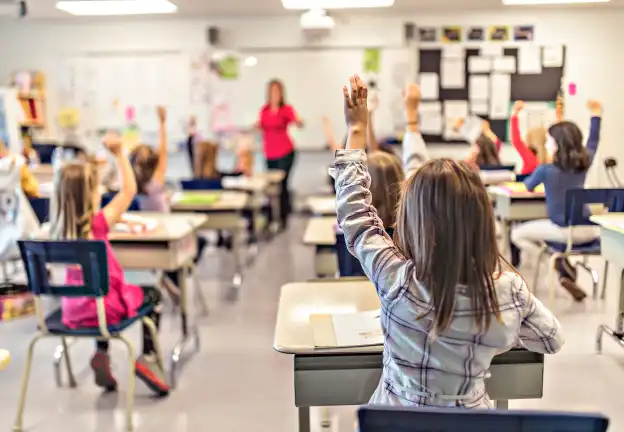 A group of children in the classroom.